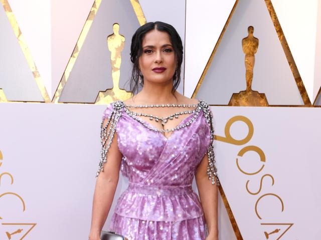 Salma’s custom embellished Gucci dress was the definition of a fashion disaster. The matronly shade, unfathomable neckpiece, confusing silhouett...