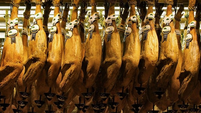 The rest of the world does not understand the reverence with which Spaniards treat their ham. Jamón Ibérico (cured Iberian ham) comes from black hoofed Iberian pigs that are fed exclusively on acorns. You can see ham legs hanging in lots of bars around Spain, and – believe it or not – a common Christmas bonus given out in companies is a whole ham leg.