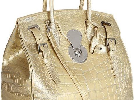 We’re back to Harrods for another tasteful bag, this one in unambiguous gold – the color of “look how much money I have”. Priced at a hefty $28,000 it is made of alligator skin and named after Ralph Lauren’s wife. According to the product description, it is also “extremely practical”, thanks to its multiple strap configurations and roomy inside pockets. Practical, that is, as long as you’re happy carrying around something that costs the same as a small car. Further proof that Harrods customers probably don’t inhabit the same world as the rest of us do – theirs is probably a world where the sea sparkles and California is picked out with orange gemstones…