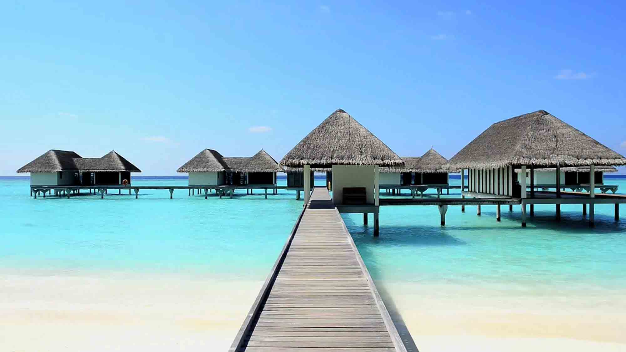 The Maldives (/ËˆmÉ’ldiËvz/ or /ËˆmÉ”ËldaÉªvz/ (About this sound listen); Dhivehi: Þ‹Þ¨ÞˆÞ¬Þ€Þ¨ÞƒÞ§Þ‡Þ°Þ–Þ¬ Dhivehi Raa'jey), officially the Republic of Maldives, is a South Asian sovereign state, located in the Indian Ocean, situated in the Arabian Sea. It lies southwest of Sri Lanka and India. The chain of 26 atolls stretches from Ihavandhippolhu Atoll in the north to the Addu City in the south. Comprising a territory spanning roughly 298 square kilometres (115 sq mi), the Maldives is one of the world's most geographically dispersed countries, as well as the smallest Asian country by land area and population, with around 427,756 inhabitants. Malé is the capital and most populated city, traditionally called the 