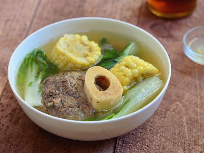 Bulalô is a beef dish from the Philippines. It is a light colored soup that is made by cooking beef shanks and marrow bones until the collagen and fat has melted into the clear broth. Bulalo is native to the Southern Luzon region of the Philippines.It is also called Kansi in Hiligaynon/Ilonggo while it is called Pochero in Cebu (not to be confused with the Tagalogs' version of pochero).Source: https://en.wikipedia.org/wiki/Bulalo