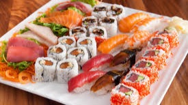 Sushi (ã™ã—, å¯¿å¸, é®¨, pronounced [sÉ¯êœœÉ•i] or [sÉ¯É•iêœœ]) is a Japanese dish of specially prepared vinegared rice (é®¨é£¯ sushi-meshi), usually with some sugar and salt, combined with a variety of ingredients (ãƒã‚¿ neta), such as seafood, vegetables, and occasionally tropical fruits. Styles of sushi and its presentation vary widely, but the key ingredient is 