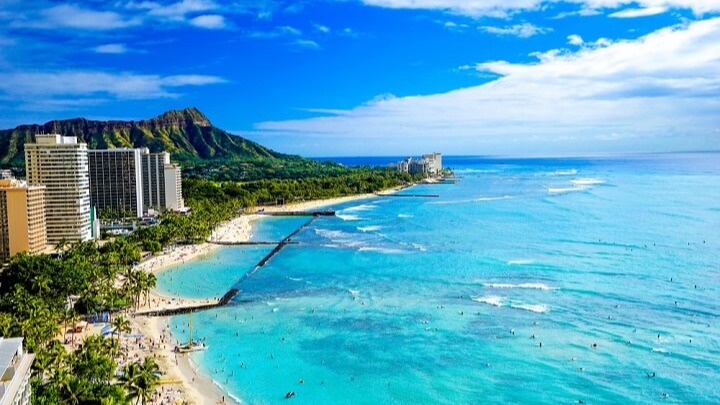 Honolulu (/ËŒhÉ’nÉ™ËˆluËluË/;[6] Hawaiian: [honoËˆlulu]) is the capital and largest city of the U.S. state of HawaiÊ»i. It is an unincorporated part of and the county seat of the City and County of Honolulu along the southeast coast of the island of OÊ»ahu.[a] The city is the main gateway to HawaiÊ»i and a major portal into the United States. The city is also a major hub for international business, military defense, as well as famously being host to a diverse variety of east-west and Pacific culture, cuisine, and traditions.Source: https://en.wikipedia.org/wiki/Honolulu
