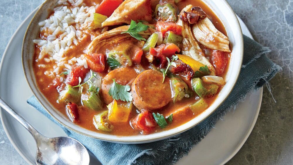 Gumbo (Louisiana Creole: Gombo) is a soup popular in the U.S. state of Louisiana, and is the official state cuisine. Gumbo consists primarily of a str...